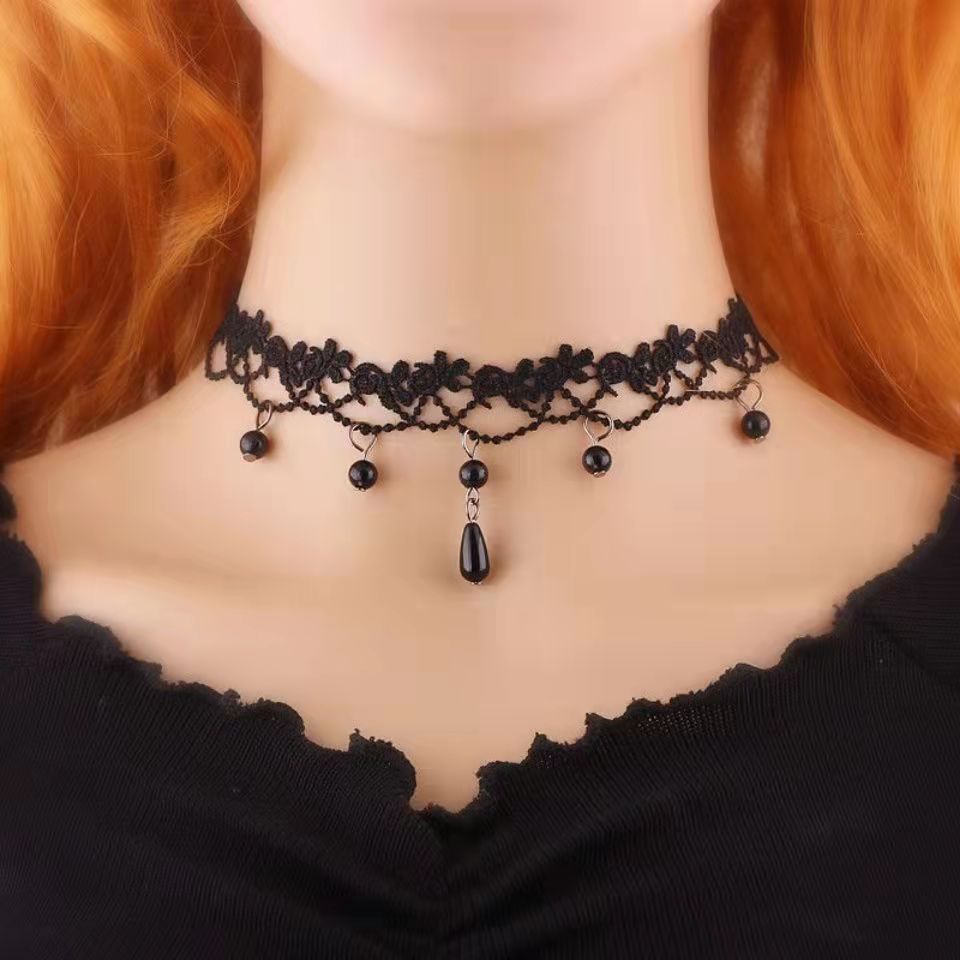 Three flowers with black pearls