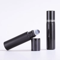 Vente en gros de flacons à bille en cristal semi-précieux de 10 ml, flacon en verre noir pour massage des yeux, distributeur d'huile essentielle pour parfums et cosmétiques