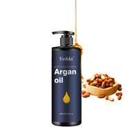 Shampooing et après-shampoing à l'huile d'argan marocaine naturelle, utilisés pour hydrater et réparer les cheveux abîmés, nourrissant le cuir chevelu