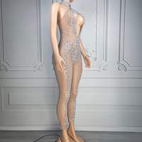 Combinaison de scène élégante pour femme Ocstrade, en maille argentée scintillante avec strass, coupe halter et jambes fines, idéale pour les spectacles et concours