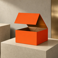 Boîte cadeau magnétique personnalisée FUSSEN, extérieur orange, intérieur doré avec doublure en feuille d'aluminium pour un design d'emballage cosmétique de luxe