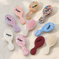 Brosse à cheveux démêlante portable en acétate nacré de 14 cm avec coussin d'air, personnalisable avec logo, cadeau idéal pour femme - Vente en gros Ume