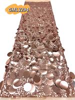Tissu en dentelle élastique brodé de couleur fantaisie, en tulle lourd orné de paillettes et de perles, avec de grandes paillettes de luxe pour robes de soirée 2026