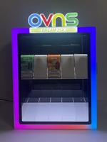 Vitrine à cigarettes en acrylique LED verrouillable personnalisée avec éclairage RGB pour comptoir de boutique de tabac