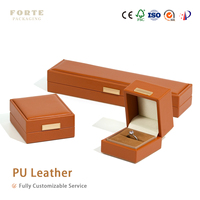 Boîtes à bijoux en cuir PU orange-brun avec plaque métallique personnalisée FORTE, vente en gros, avec logo sur mesure