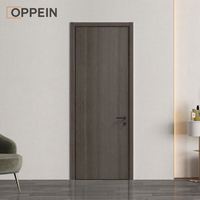 Porte pleine en PVC et bois OPPEIN, design moderne, étanche, pour entrée de villa et fenêtre