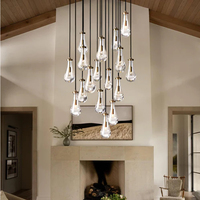 Lustre moderne de luxe en laiton doré, suspension décorative LED en verre en forme de goutte de pluie pour entrée à plafond haut