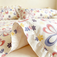 Parure de lit florale colorée à volants, imprimé floral, douce et agréable pour la peau, 4 pièces (housse de couette, taies d'oreiller, drap) – Vente en gros, style simple