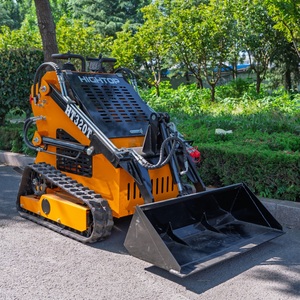 Chargeuse compacte sur chenilles Kubota Diesel HT320T avec tarière et fendeuse de bois, conception compacte pour équipement d'aménagement paysager - Product Image 1