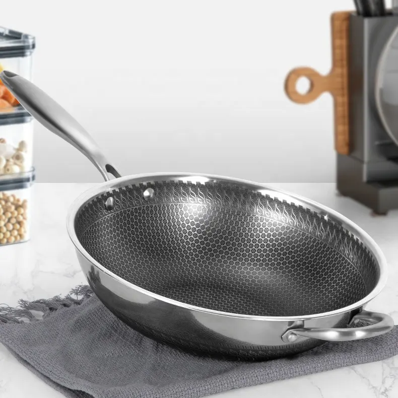 Commercio all'ingrosso stoviglie a risparmio energetico cinese Wok antiaderente Wok Triply acciaio inossidabile Non bastone padella Wok con coperchio in vetro