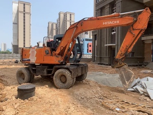 Excavatrice sur pneus Hitachi EX100 d'occasion de 10 tonnes, faible nombre d'heures de travail, certifiée CE, godet Kubota, brise-roche à attache rapide, Daewoo - Product Image 2