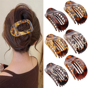 Pince à cheveux rétro en forme d'arc léopard - Résine plastique, accessoire de cheveux sophistiqué pour les coiffures quotidiennes et les tenues élégantes - Product Image 1