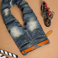 Nouveau style Pantalon homme déchiré et usé avec empiècements artistiques, coupe skinny motard, noir et bleu, en jean