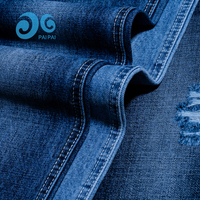 Tissu denim uni épais 7 fils non extensible rigide indigo qualité stable tissage épais pour veste en jean pour garçons vêtements de travail OEM faible MOQ