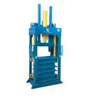 Presse à balles verticale de 60 tonnes Presse à balles textile hydraulique Presse à balles de recyclage de vêtements avec conception de chambre de levage