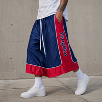 Shorts de basketball longs pour hommes en nylon rouge et bleu avec logo personnalisé OEM, taille à cordon de serrage et passepoil