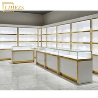 Vitrine de présentation de bijoux haut de gamme en or blanc avec comptoir en verre trempé
