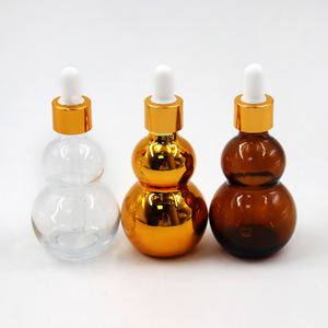 Bouteilles en verre compte-gouttes transparentes ambrées brillantes en forme de cantaloup de 15 ml, 20 ml, 30 ml, 50 ml pour huiles essentielles - Product Image 6