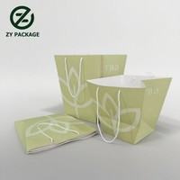 Vente en gros de sacs à main en papier kraft avec fleur à fond carré de luxe design de bouquet pour emballage cadeau de gâteau de fleur