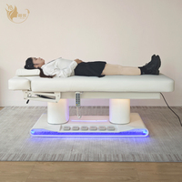 Lit de massage complet chauffant de haute qualité, durable, blanc, à 4 moteurs, avec réglage de la hauteur, design moderne et luxueux pour salon de beauté
