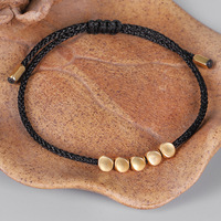 Pulsera budista tibetana trenzada hecha a mano creativa de nuevo diseño, pulsera de cuerda de la suerte con cuentas de cobre irregulares para hombres y mujeres, joyería