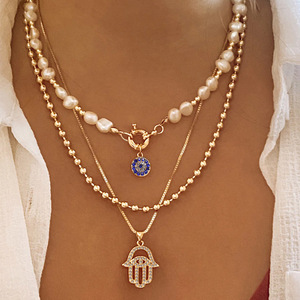 Collares multicapa exagerados para mujer, <span class=keywords><strong>cadena</strong></span> de perlas de imitación, colgante de ojo y <span class=keywords><strong>palma</strong></span> con diamantes de imitación, joyería de fiesta - Product Image 1