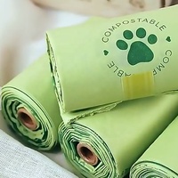 Sacs de crottes de chien compostables en PLA + PBAT + amidon de maïs du fabricant écologique biodégradables pour application de chats sac de crottes personnalisé