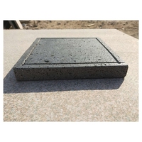 Roches volcaniques naturelles pierre de lave Steak rond pierre et barbecue plaque cuisson chaude sur ustensiles de cuisine en plein air pierre servant des aliments ardoise