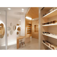 Présentoir optique fonctionnel de vitrine d'affichage de lunettes de stratifié de verre de conception de magasin optique professionnel