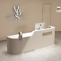 Comptoir de réception de spa moderne en forme de L Bureau d'accueil en pierre à surface solide Salon de beauté Conception libre Tailles personnalisées disponibles