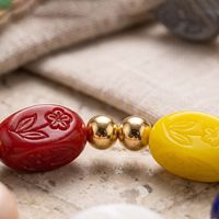 Bracelet extensible en perles ovales en verre sculpté fleuri coloré avec perles intercalaires dorées en acier inoxydable, fait main pour femme