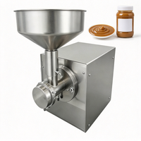 Le moulin à beurre de cacahuètes présente un design traditionnel de moulin à pierres, produisant une pâte fine et lisse, facilement lavable.