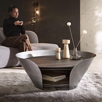 Table basse ronde à double plateau en céramique avec rangement, design unique pour le salon