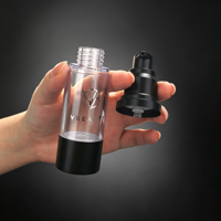 Flacon de lotion sans air noir personnalisé de 30 ml avec contenants cosmétiques en plastique et pompe sans air pour l'emballage des soins de la peau