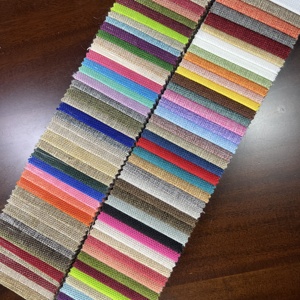 Tela de tapicería de poliéster 100% transpirable tejida duradera con textura sólida de lino para fundas de cojines de asiento de sillón de sofá - Product Image 2