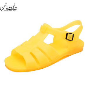 Taglie forti <span class=keywords><strong>sandali</strong></span> romani per uomo <span class=keywords><strong>donna</strong></span> in plastica PVC giallo gelatina <span class=keywords><strong>sandali</strong></span> con fibbia alla caviglia <span class=keywords><strong>sandali</strong></span> piatti da spiaggia - Product Image 1