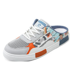 Pantalones cortos de verano para hombre con detalles trenzados, transpirables, de talla grande, con orificios de malla grandes, para deporte. - Product Image 1