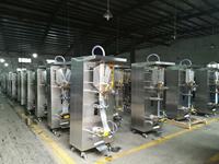 Machine de production, d'emballage, de scellage et de remplissage entièrement automatique pour sachets de boissons au lait, d'eau pure et de liquides