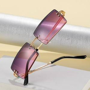 Lunettes de soleil de luxe de marque, style rétro, sans monture, en alliage, unisexe, pour femmes, avec logo métallique - Product Image 1