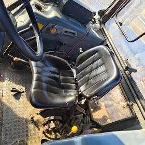 Tracteur à roues Shanghai Holland 804 d'occasion, 4x4, 80 CV, moteur diesel <span class=keywords><strong>4</strong></span> cylindres, boîte de vitesses, cabine fermée, bleu noir, 2000 heures de fonctionnement - Product Image 5