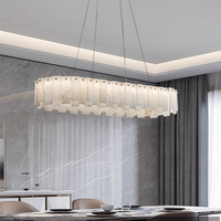 Suspension linéaire contemporaine en acier brossé et albâtre, luminaire de luxe pour salon et salle à manger, lustre en marbre