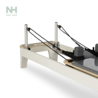 Machine de Pilates Reformer en Bois Blanc Durable Personnalisée, Lit Multifonctionnel pour Entraînement du Core à Domicile et en Studio