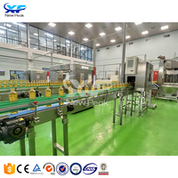 Nouvelle ligne de production de machines de remplissage automatique d'huile comestible Peak pour le remplissage et le bouchage de bouteilles d'huile de cuisson