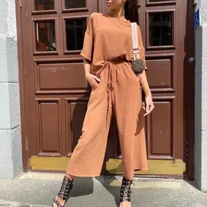 Trending 2022 Summer Casual Trousers Set Drop Shoulder Short Sleeve T Shirt and Pants Two Piece Pants Set for Ladies