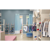 Idées de décoration personnalisées LUX, décoration charmante, présentoir pour enfants, vêtements pour enfants, magasin de vêtements pour bébés, design d'intérieur