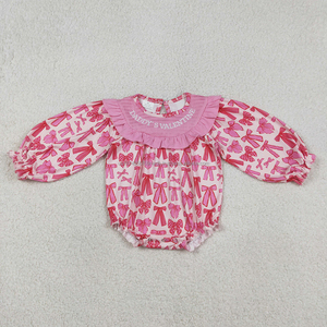 Ropa de Bebé de Moda al por Mayor: Romper Smocked Rosa con Flores y Lazos para Niñas, de Algodón Orgánico Suave - Colección Stock Trendyism Boutique - Product Image 6