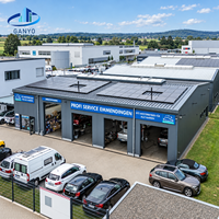 Atelier préfabriqué en acier pour la réparation automobile avec structure de toit droite et aménagement de baie de service pour véhicules