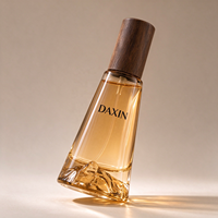 Vente en gros de flacons de parfum en verre personnalisés avec logo, 30 ml, forme conique pyramidale, fond volcanique, flacon de parfum rechargeable avec bouchon en bois
