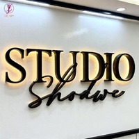 Enseigne personnalisée à lettres inversées Halo, logo mural en métal et acrylique rétroéclairé par LED pour hall d'accueil de bureau et immobilier