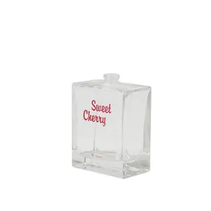 Botol parfum 100ml kaca transparan persegi cetak layar merah dengan penyemprot perak dan tutup plastik
